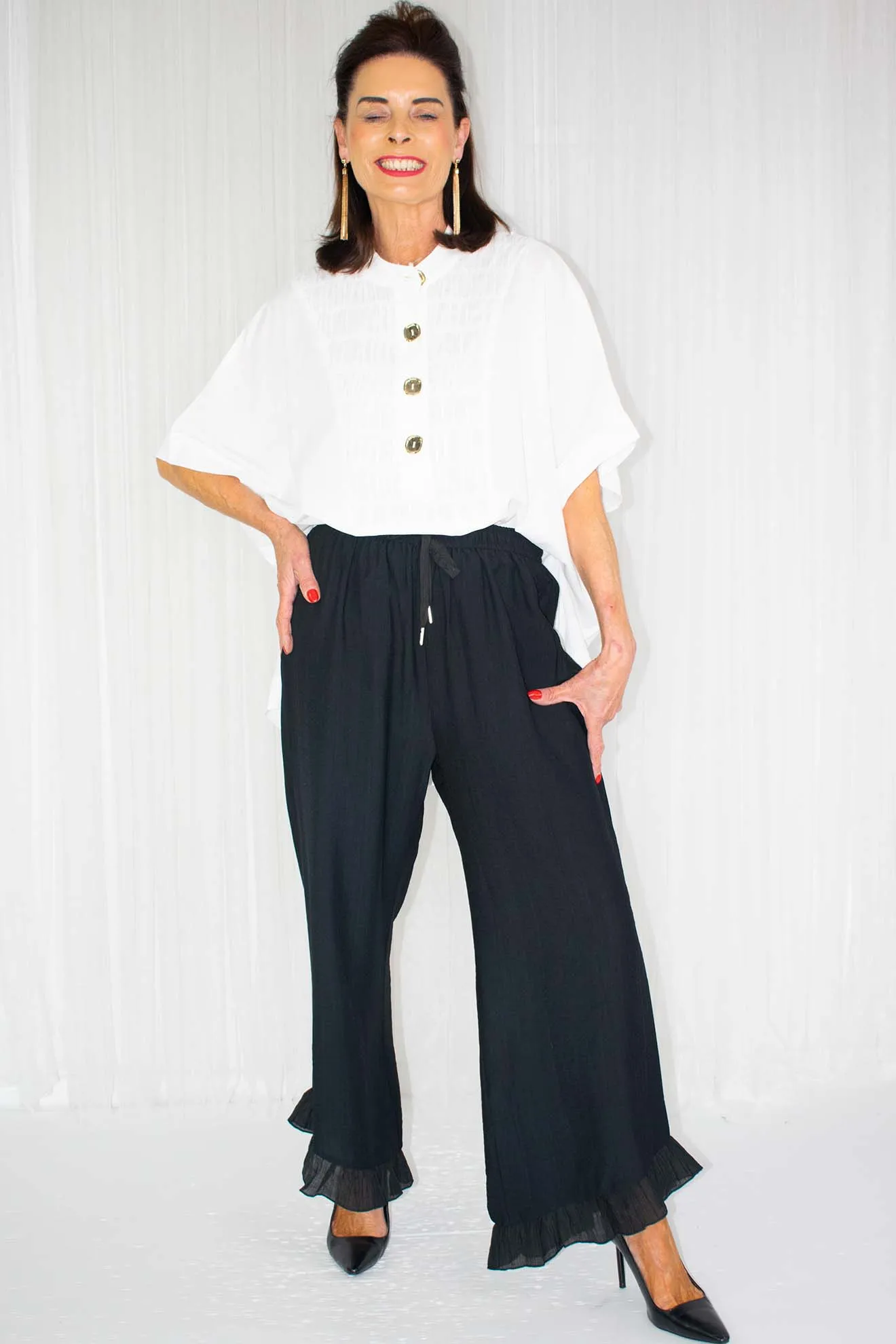 Remi Ruffle Hem Trouser in Black
